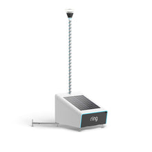 Ring mobile security device with tall pole-mounted camera and light, attached to a portable unit featuring a tilted solar panel and iLoq smart lock built-in on a white background.