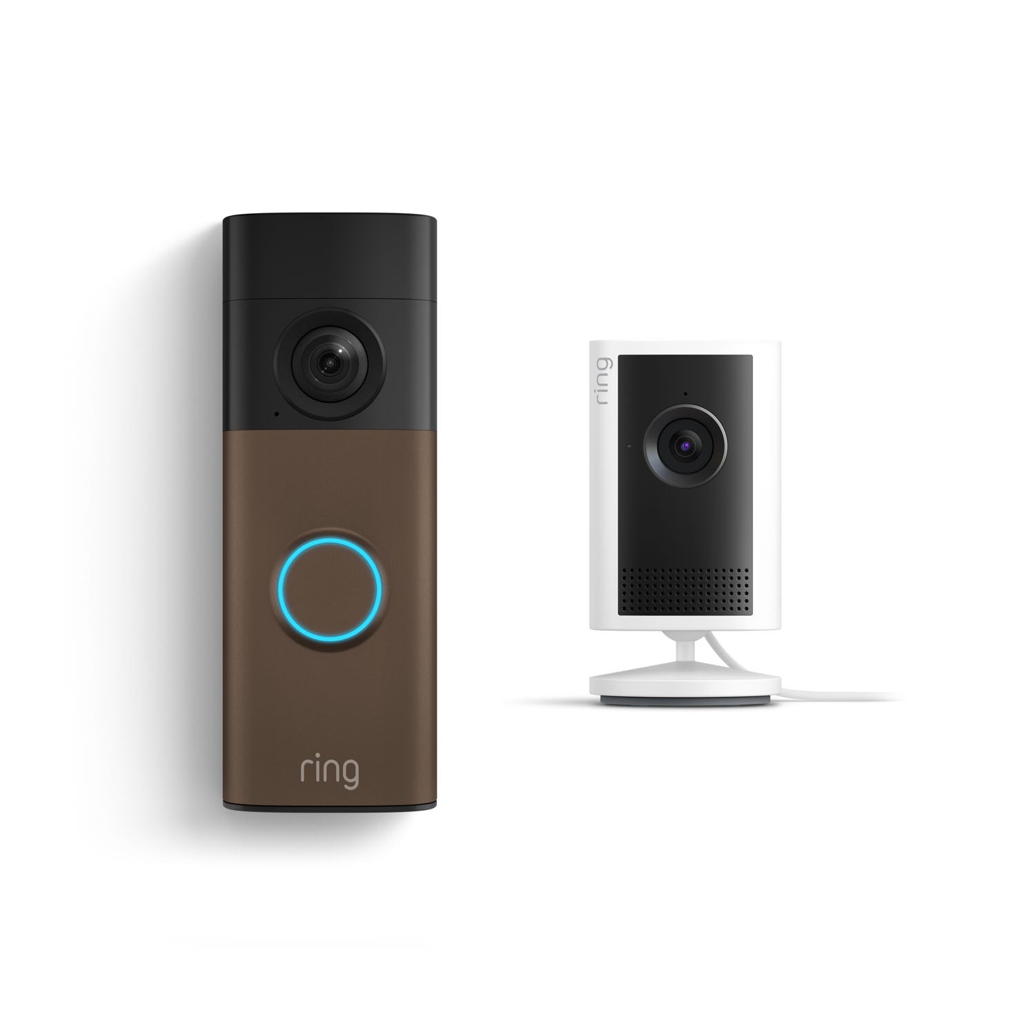 Ring brown and black video doorbell with blue-lit button next to a small white indoor camera on a stand, both against a white background.