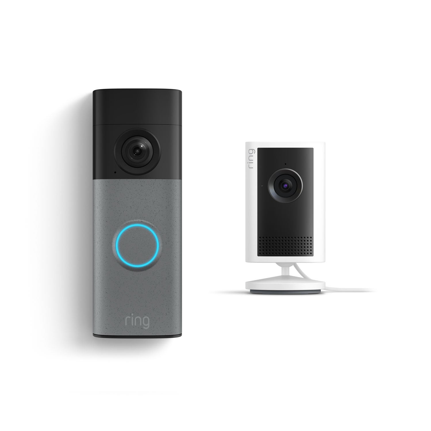Ring smart doorbell with glowing blue ring next to a compact white indoor camera on a stand, both shown against a white background.