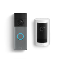 Two Ring devices on a white background: a rectangular video doorbell with a blue-lit button and a cylindrical indoor camera, both in white and black.