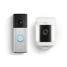 Two Ring devices on a white background: a silver video doorbell with a blue-lit button and a white floodlight camera with side lights.