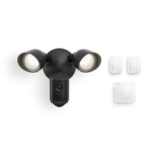 Black Ring floodlight with built-in camera, twin LED lamps, and three white wireless sensors displayed on a white background.