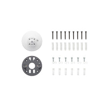 White camera mount and grey mounting plate, screws, wall anchors, and cable clips arranged neatly on a white background.
