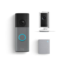Ring doorbell with glowing blue button, a compact indoor camera on a stand, and a small gray chime speaker on white background.