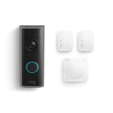 Ring doorbell with blue-lit button and camera, shown with two white contact sensors and a square wireless chime on a white background.