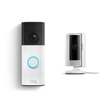 Ring doorbell with glowing blue button next to a compact white indoor camera on a stand, both against a white background.