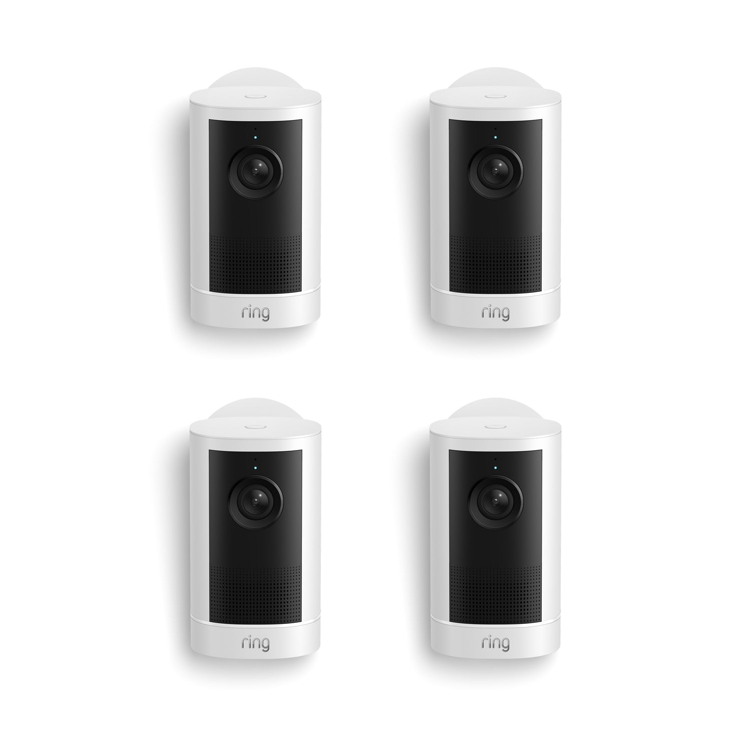 Set of four white Ring  cameras with black fronts, each showing a lens and speaker grille, arranged in a 2x2 grid on a white background.