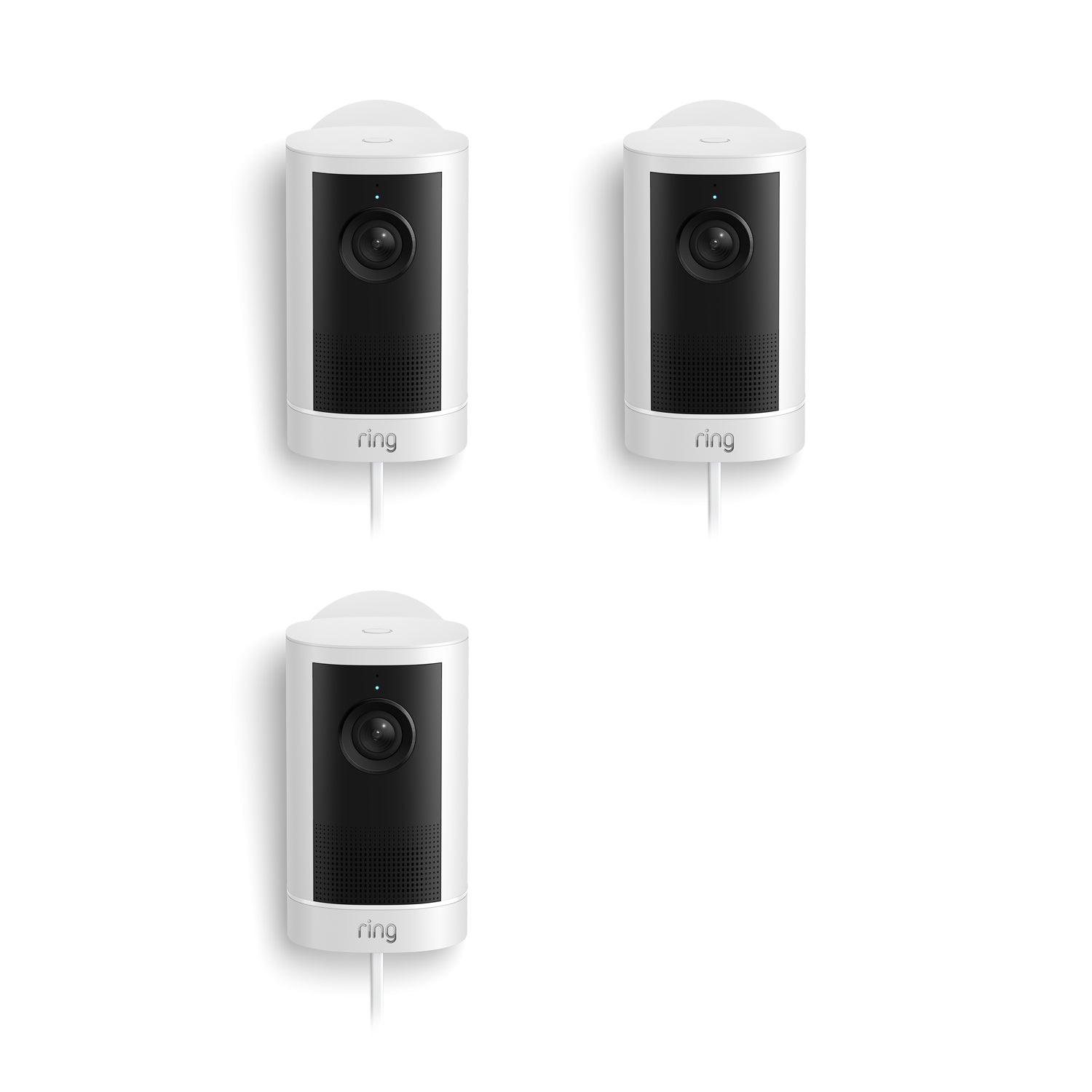 Three white Ring plug-in cameras with black fronts shown on a white background, each with lens, speaker grille, and cord.