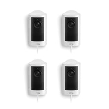 Set of four white Ring plug-in cameras with black faceplates, front lenses, and status lights on a white background.