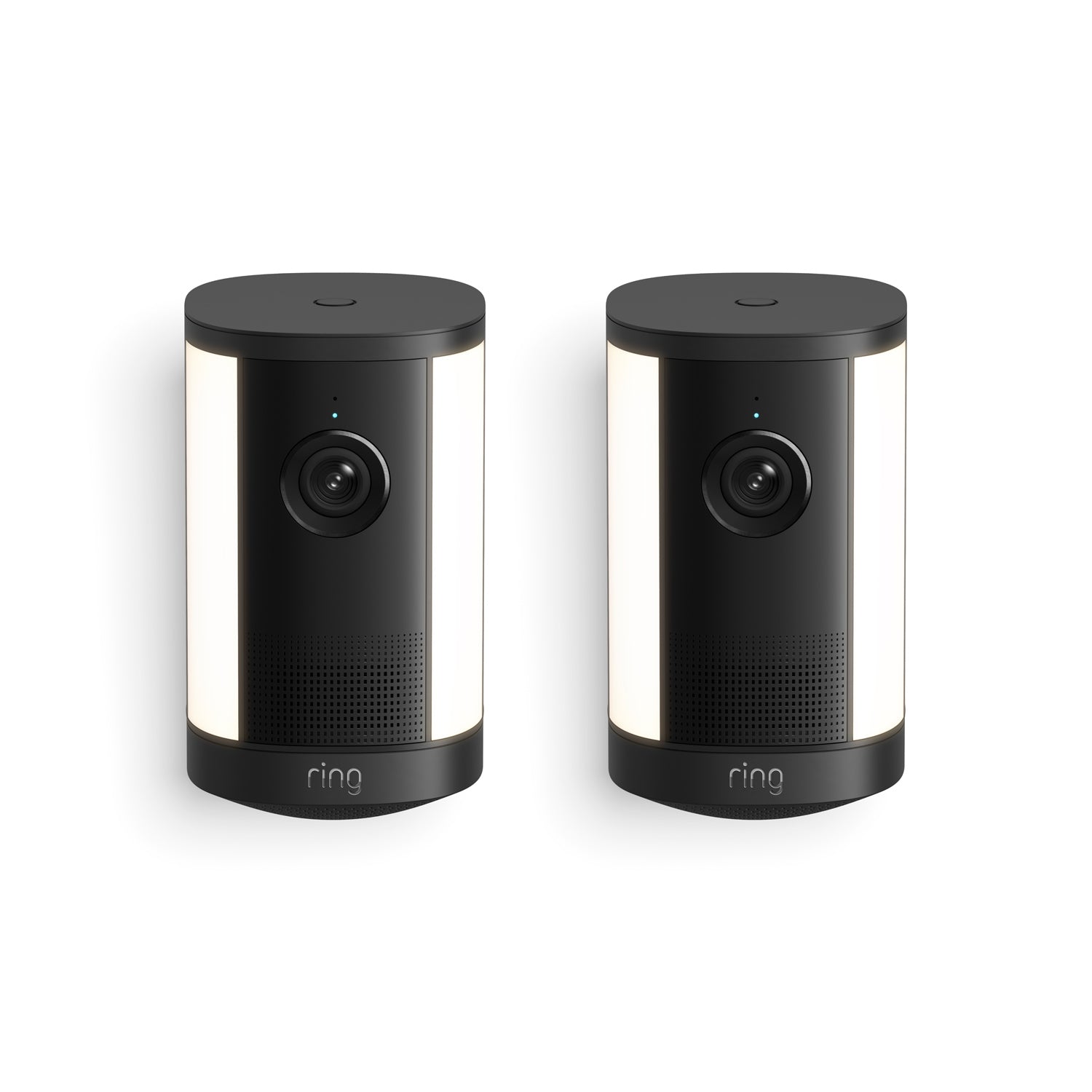 Pair of black Ring outdoor cameras with cylindrical design, front lenses, LED status lights, and side light panels on a white background.