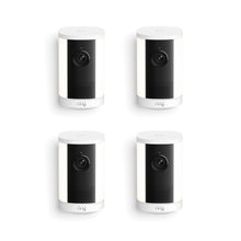 Set of four white Ring spotlight cameras with black fronts, arranged in a grid on a white background.