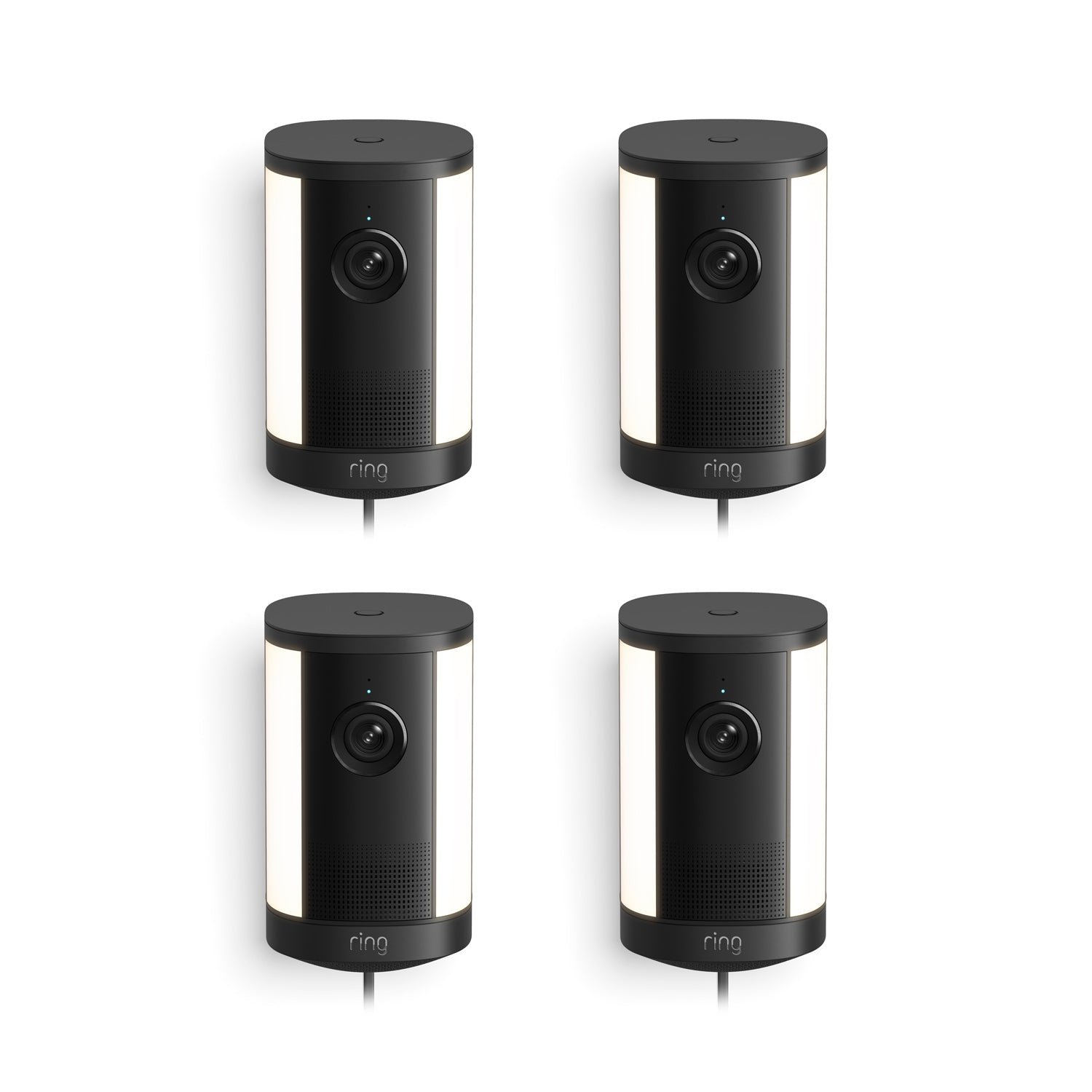 Set of four black Ring spotlight cameras with built-in lights, arranged in a grid on a white background.