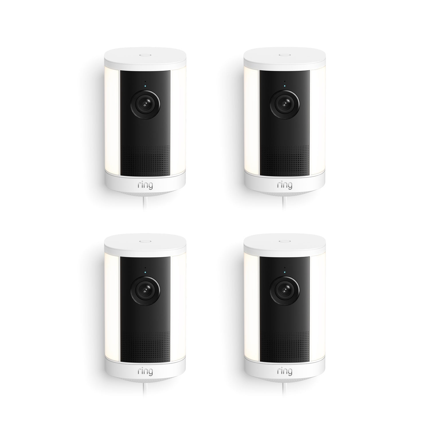 Set of four white and black Ring spotlight cameras with cylindrical design, front lens, speaker grille, and cords against a white background.