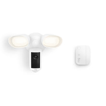 Ring Floodlight Cam 4K Plus (Wired) in white with a white Window & Door Sensor.