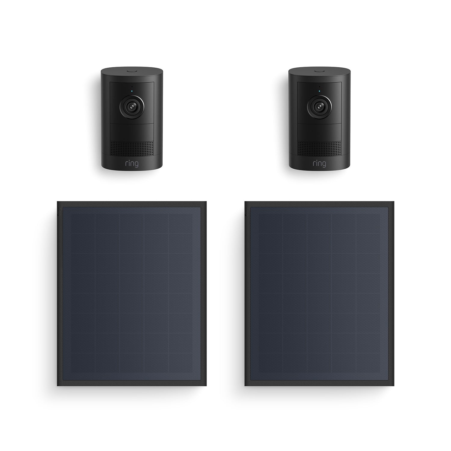 Two black Ring indoor/outdoor cameras paired with two rectangular solar panels on a white background.