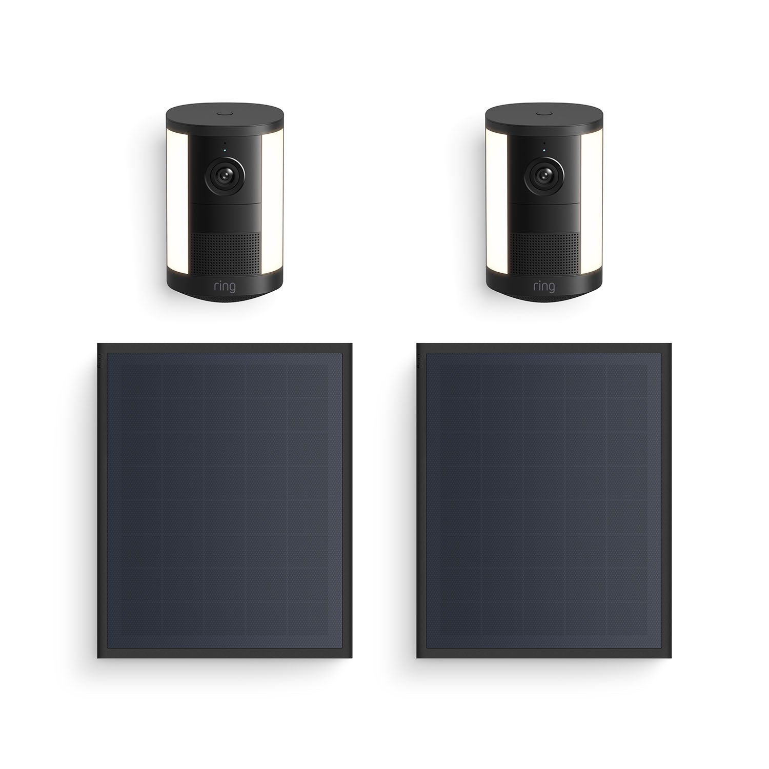 Two black Ring spotlight cameras with lights, paired with two rectangular black solar panels on a white background.