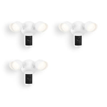 Three white outdoor floodlight camera units against a white background, each with two angled lights and a centered camera module.