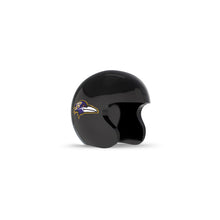 Glossy black half helmet with purple-and-gold raven logo on the side, open face design, set against a white background.