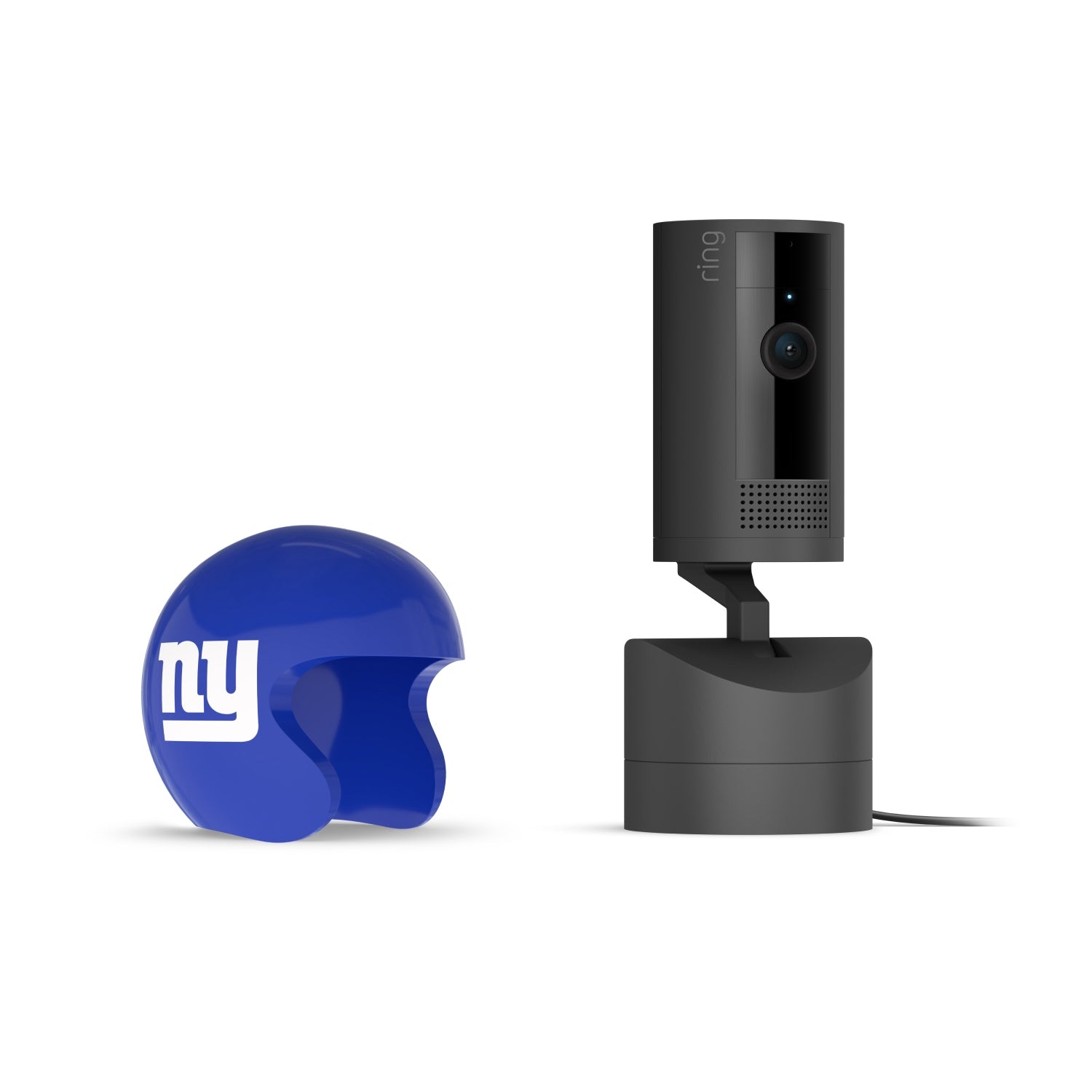 Black Ring indoor camera on a stand with power cord, next to a blue mini football helmet with white “ny” logo on a white background.