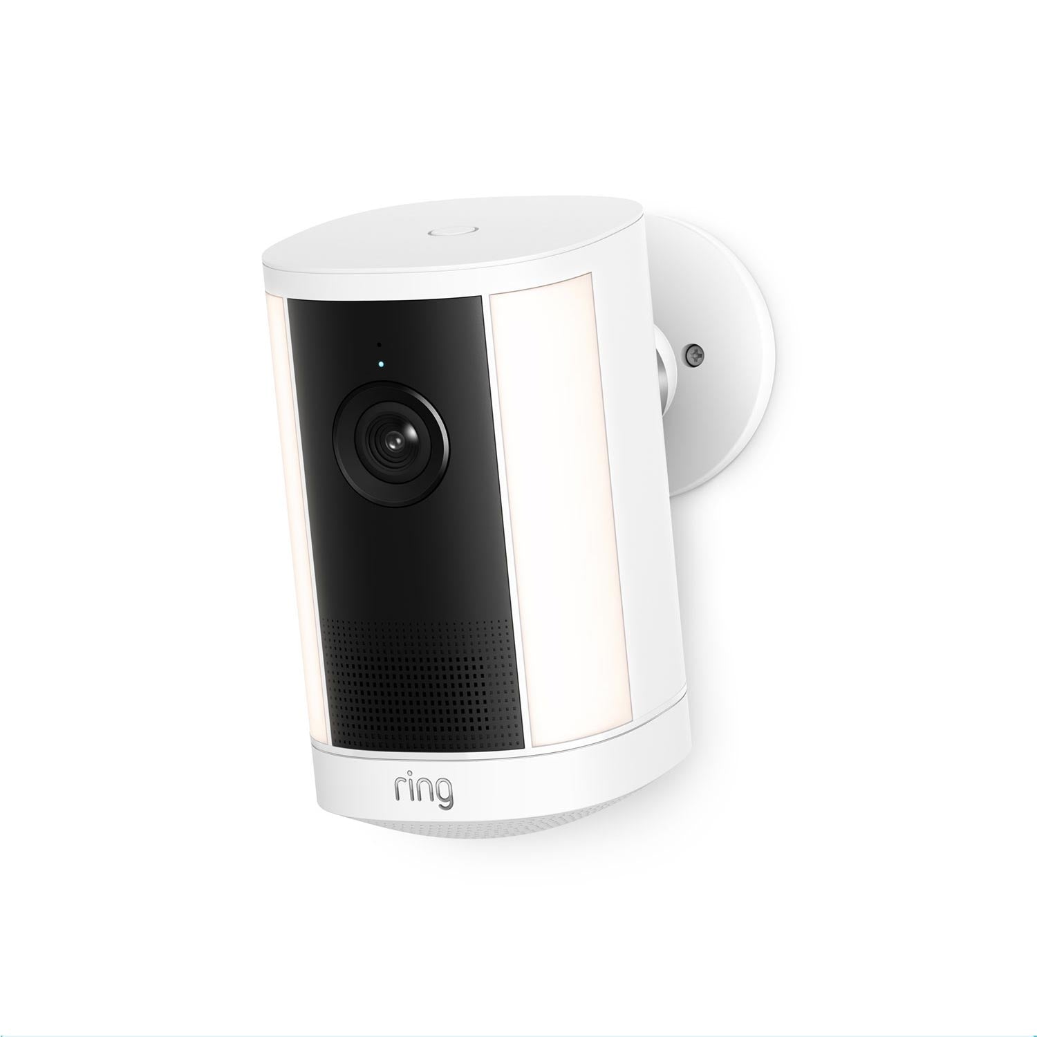 White Ring outdoor camera with black lens panel, side LED light strips, and speaker grille, mounted on a wall bracket.