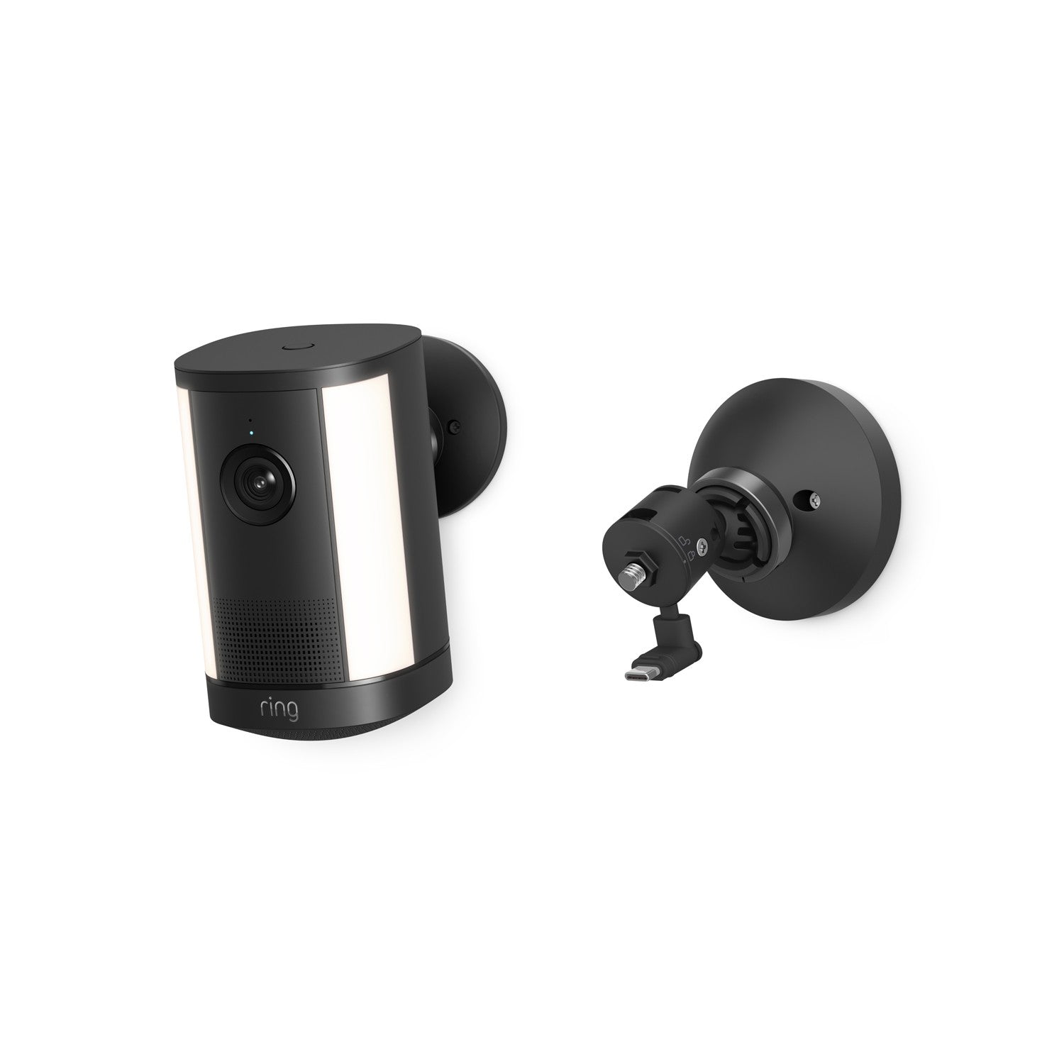 Black wall-mounted smart camera with dual light panels and lens centered on front, shown beside an adjustable mounting bracket.