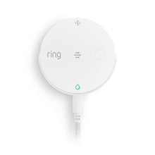 White:White circular Ring water sensor device with logo, speaker, button, and blue water droplet indicator on white background.